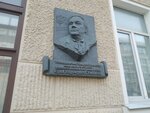 Ю. В. Семеняки (Советская ул., 19), мемориальная доска, закладной камень в Минске