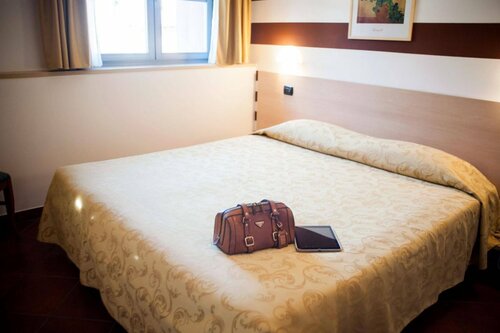 Гостиница Hotel Lizard в Комо