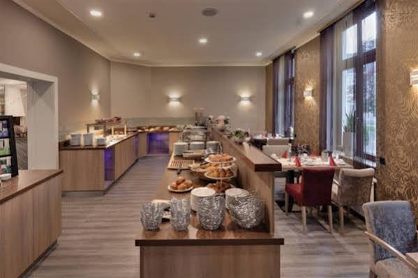 Фото Hotel Am Schloss Aurich Schlossresidenz