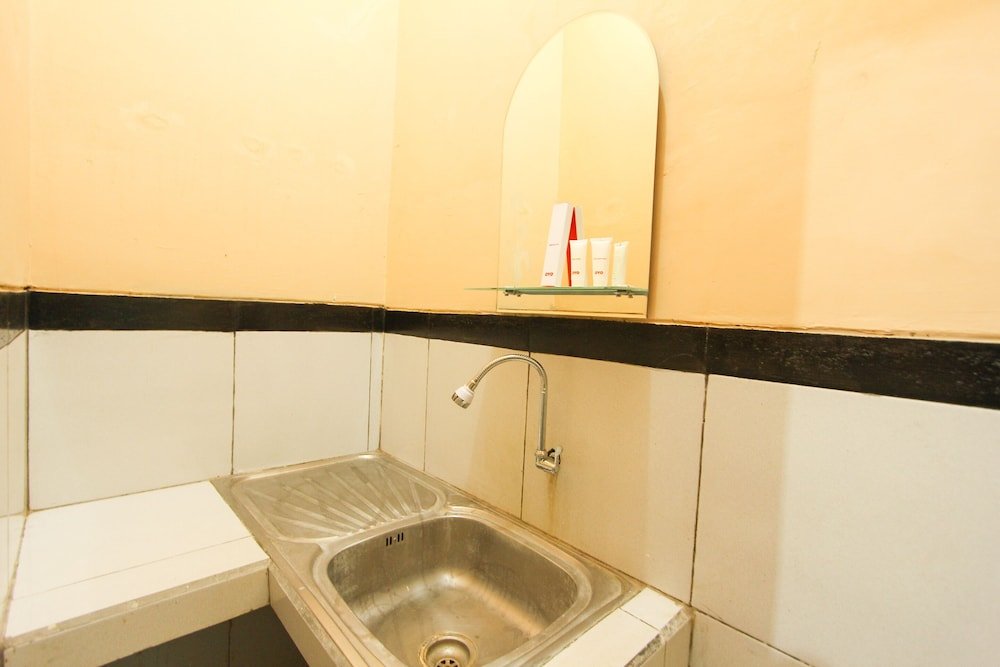 Фото Oyo 1594 Al Firdausi Residence