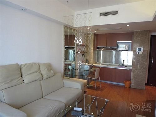 Фото Guangzhou Damei Apartment