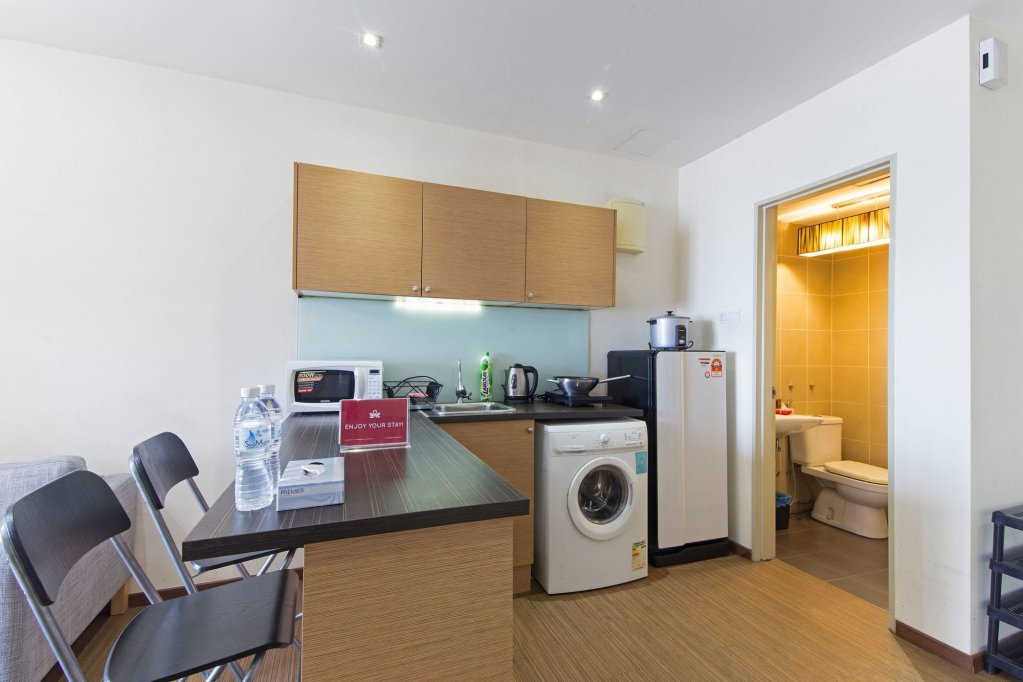 Фото Zen Home Taragon Residences