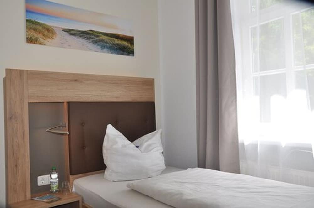 Фото Hotel Pension Zum Alten Fährhaus