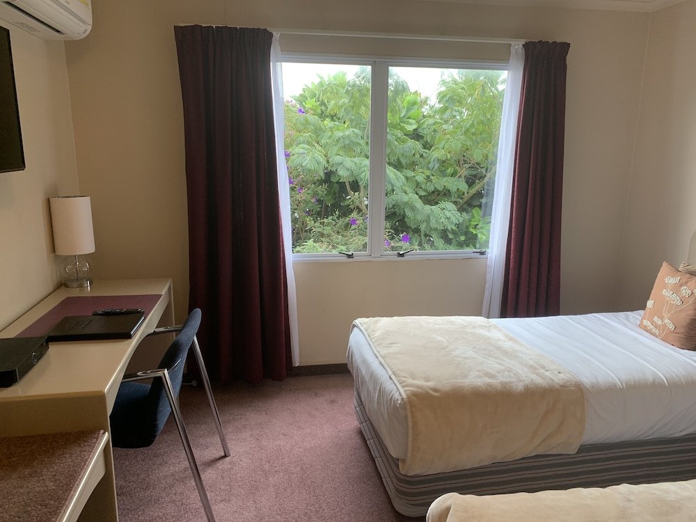 Фото Asure Camelot Arms Motor Lodge