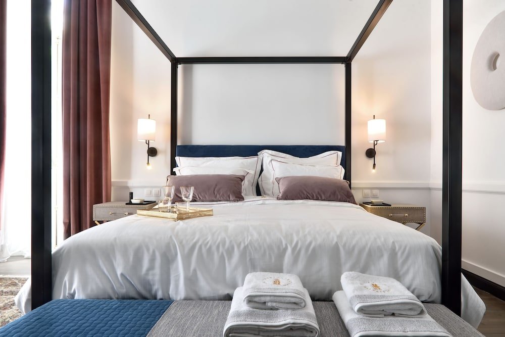 Фото 2 Mazi Suites