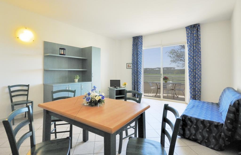 Фото La Cecinella Apartments