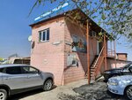 Kompleks po realizatsii stroymaterialov u Parovoza (Vokzalnaya ulitsa, 55) ، متجر مستلزمات البناء