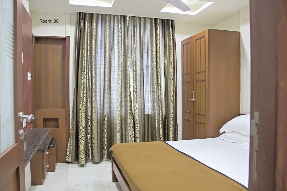 Фото Click White House Residency Vadodara