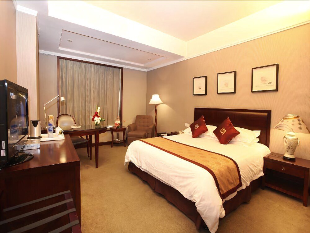 Фото New Century Hotel Pujiang