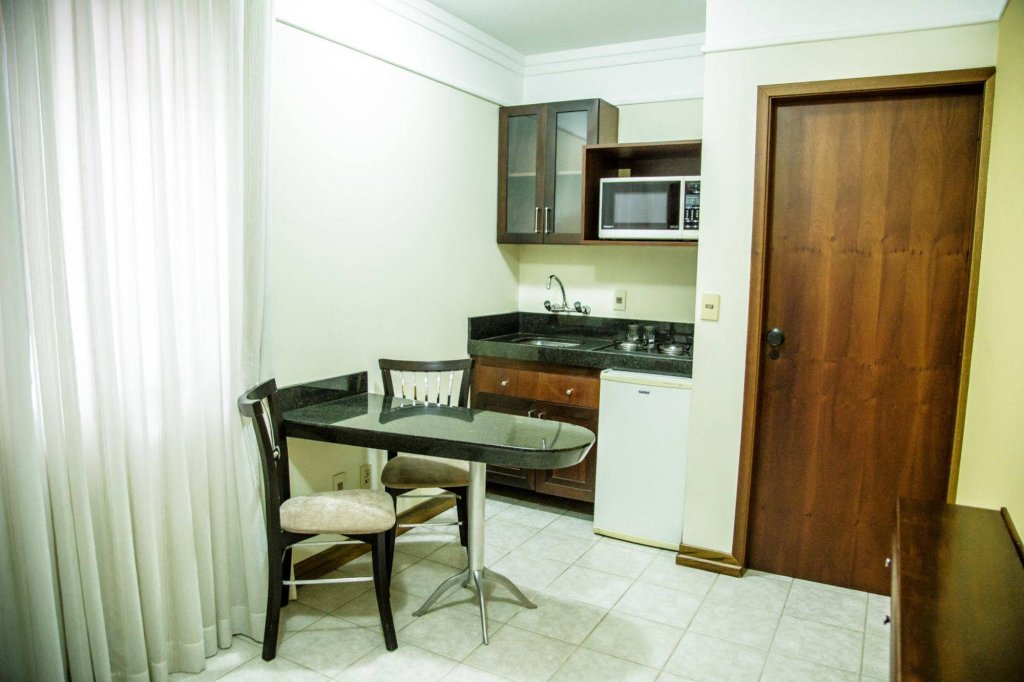 Фото Le Village Flats Hotel e Business