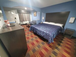 Гостиница Scottish Inns and Suites East Sam Houston Pkwy