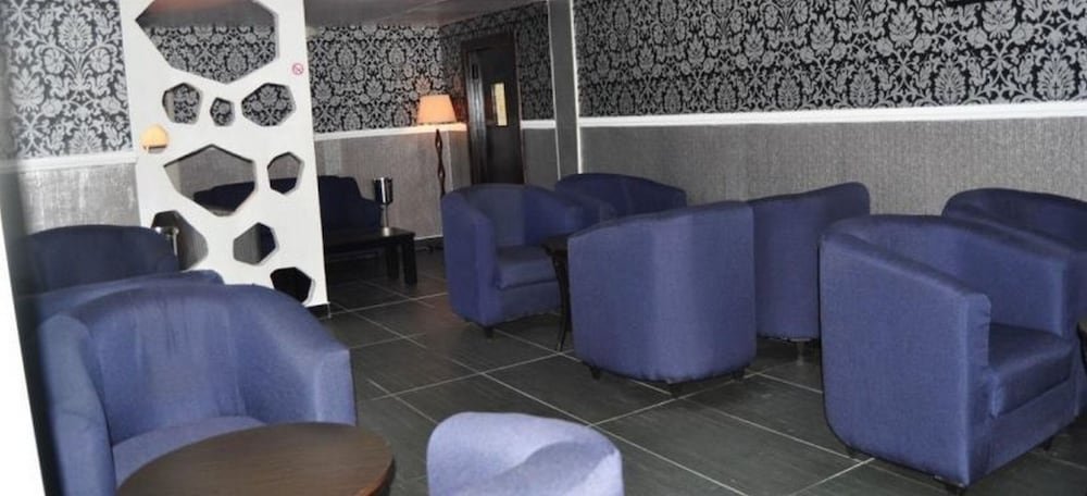 Фото De Brass Suites Hotel