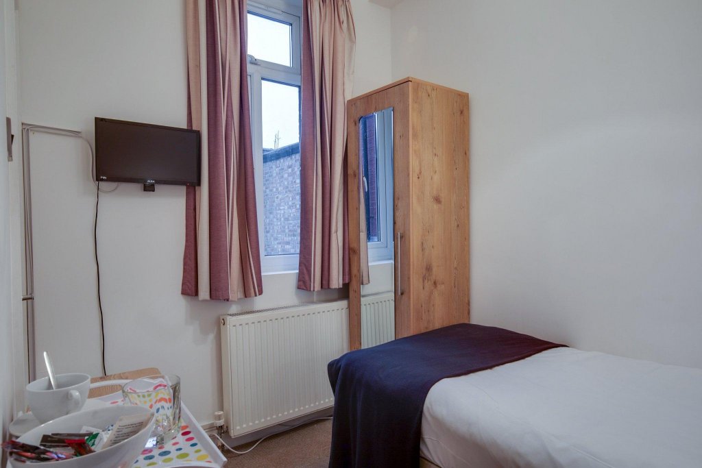 Фото Oyo TamTam Acton Hotel