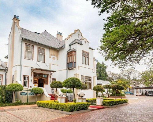 Внешний вид отеля Courtyard Hotel Arcadia в Претории, фото 1