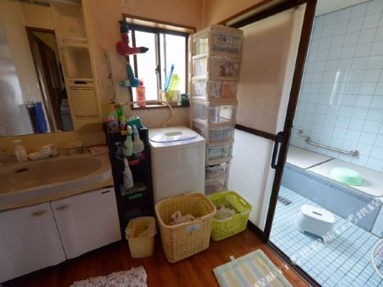 Фото Guesthouse Amami Long Beach