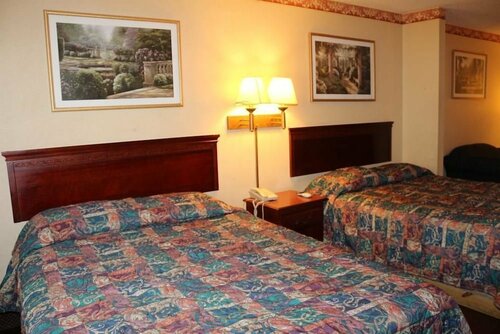 Гостиница Magnolia Bay Hotel & Suites