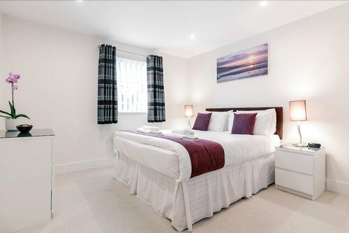Гостиница Roomspace Apartments -Capitol Square