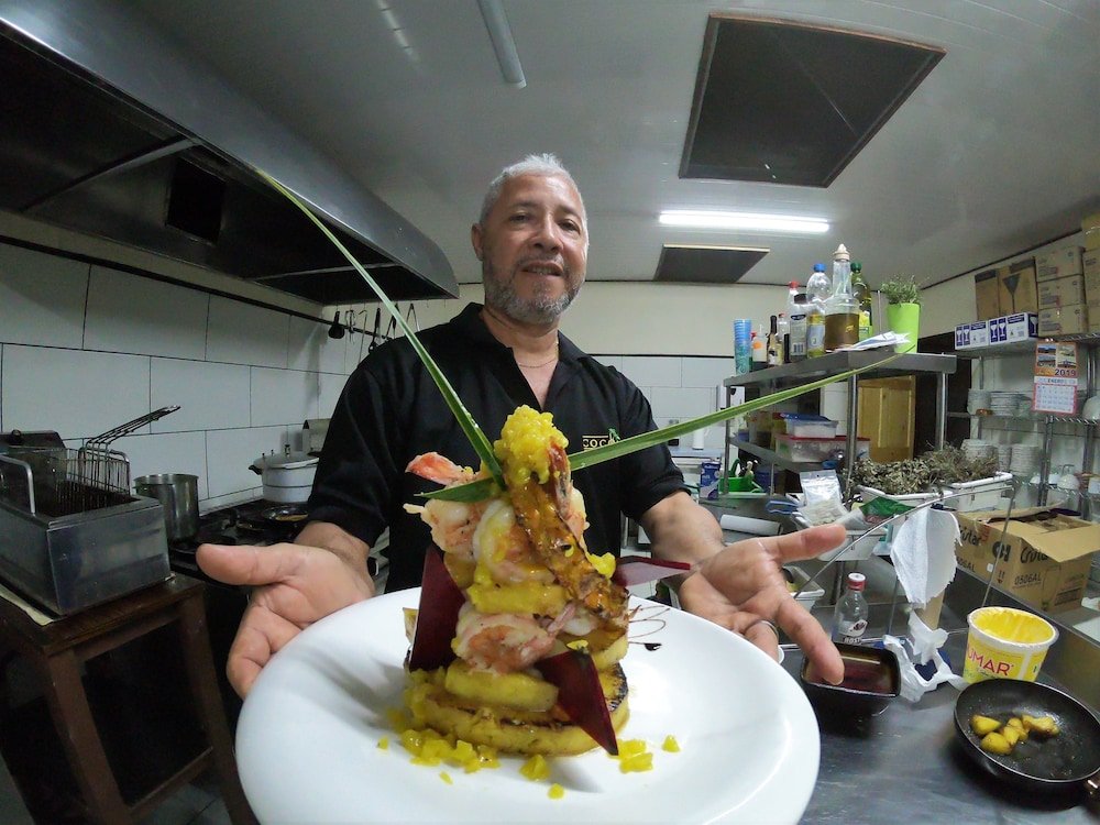 Фото Cocomar Beachfront Hotel and Island Resort