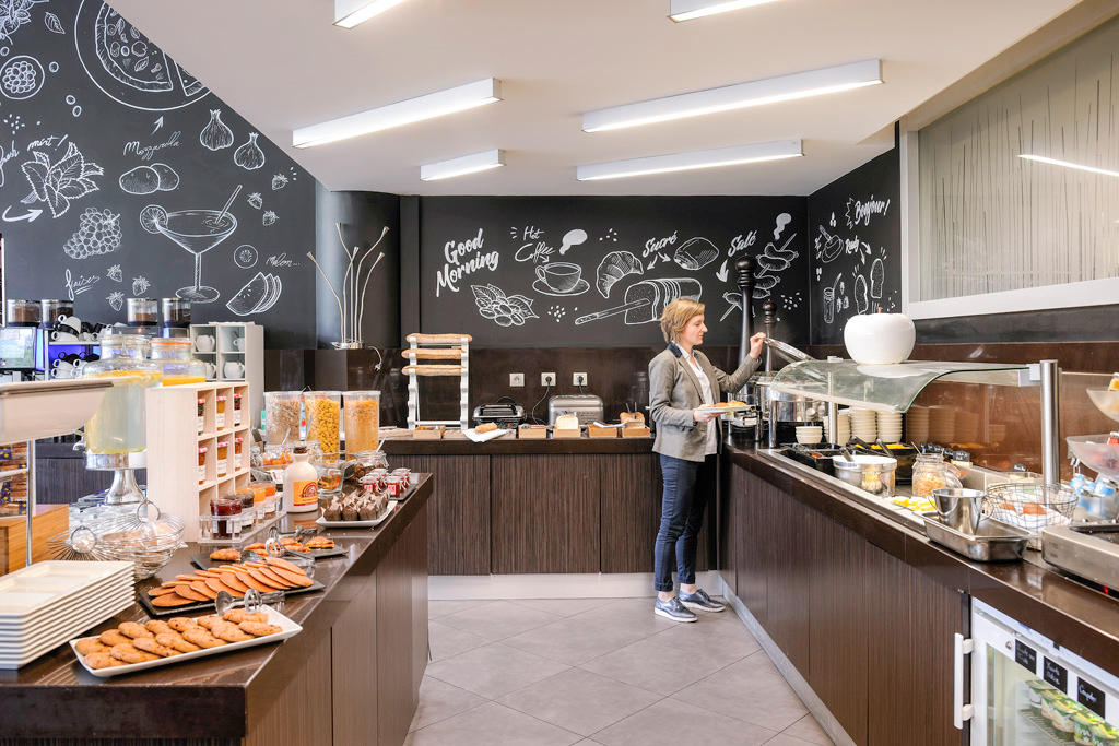 Фото Novotel Lyon Centre Confluence Bord de Saone