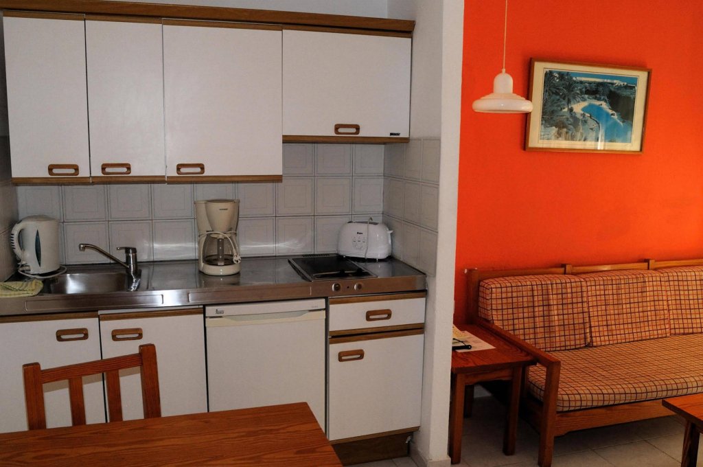 Фото Apartahotel Costa Volcán