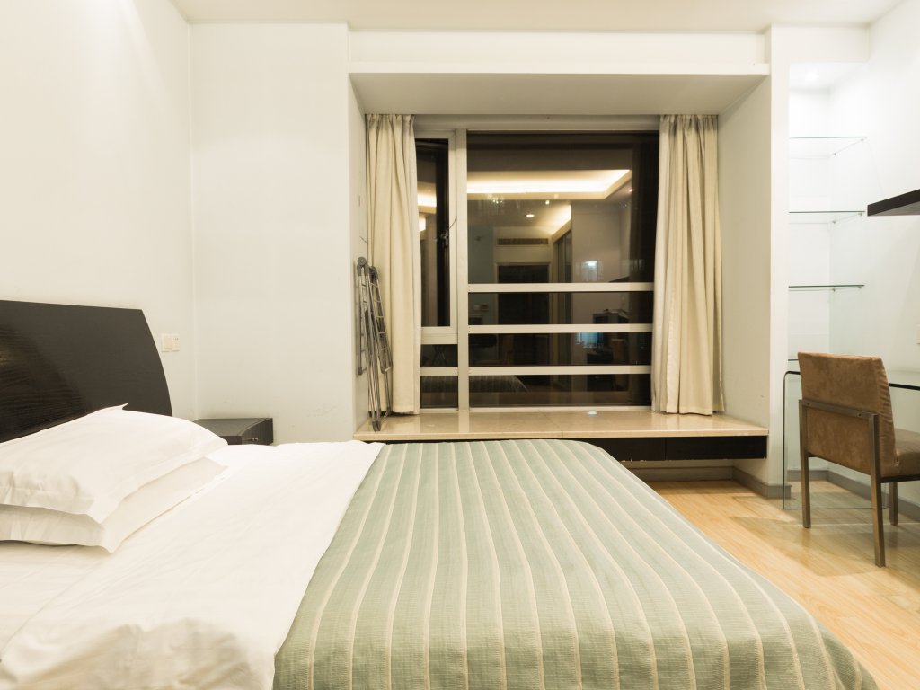 Фото Shanghai Jiarong Hotel Apartment