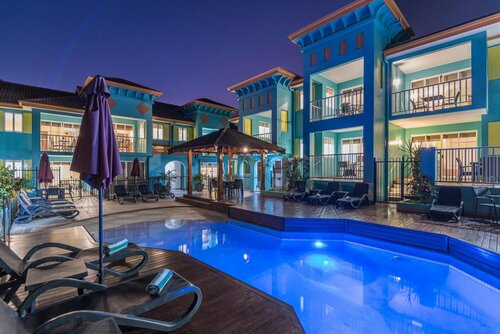 Гостиница Le Cher Du Monde Hotel в Порту-Дугласе