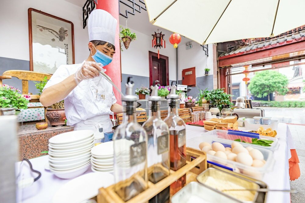 Фото Chengdu Wenjun courtyard Hotel