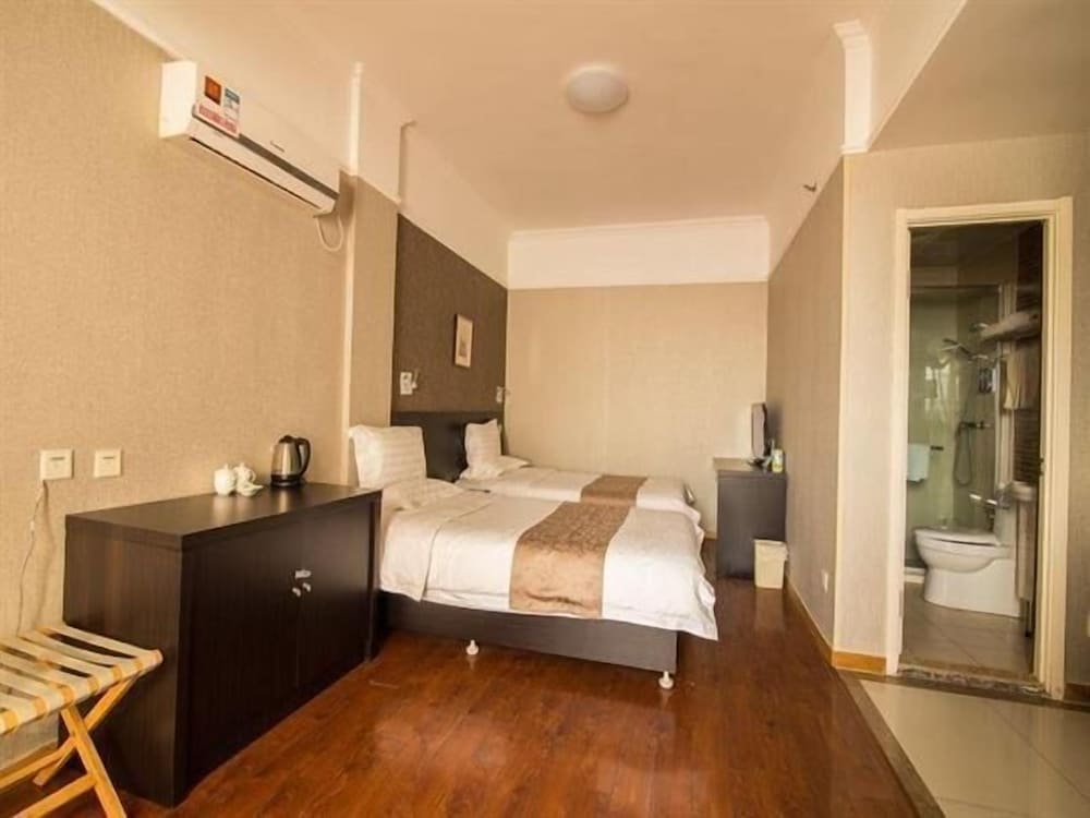 Фото Ramada Encore by Wyndham Qingdao Shinan