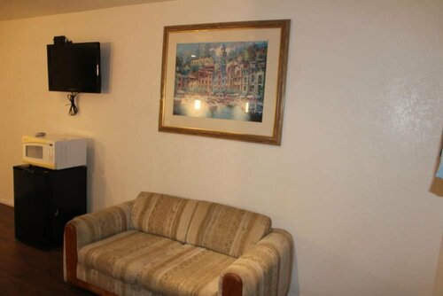 Гостиница Oceanside Inn and Suites в Оушенсайде