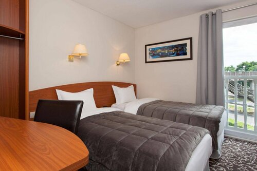 Гостиница Comfort Hotel Acadie Les Ulis