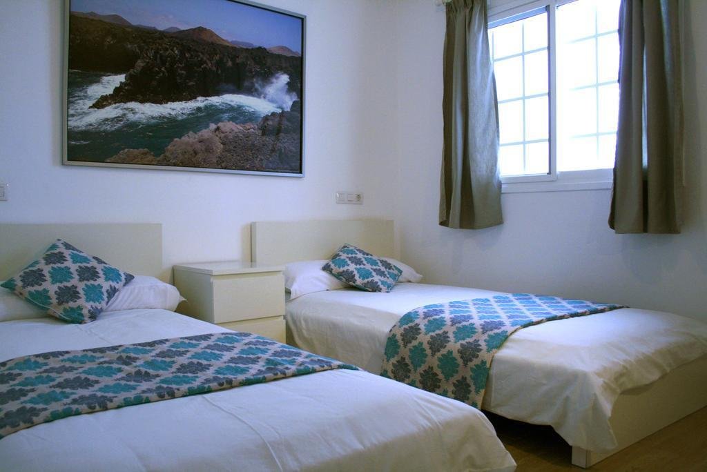 Фото Apartahotel Costa Volcán