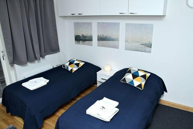 Гостиница Kotimaailma Apts Joensuu Koulukatu 21 в Йоэнсуу