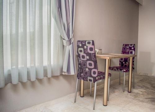 Фото Cosmos Apartments