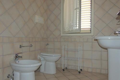 Фото Affittimoderni Isola Rossa Élite