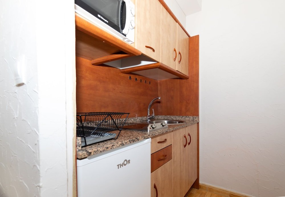 Фото Unique Hotel Apartments