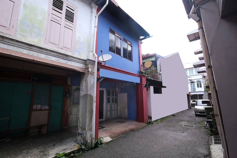 Фото Spot On 89929 Tropical Lodge