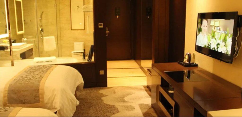 Фото Grand New Century Hotel Fuyang