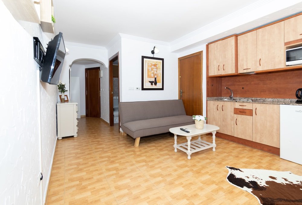 Фото Unique Hotel Apartments