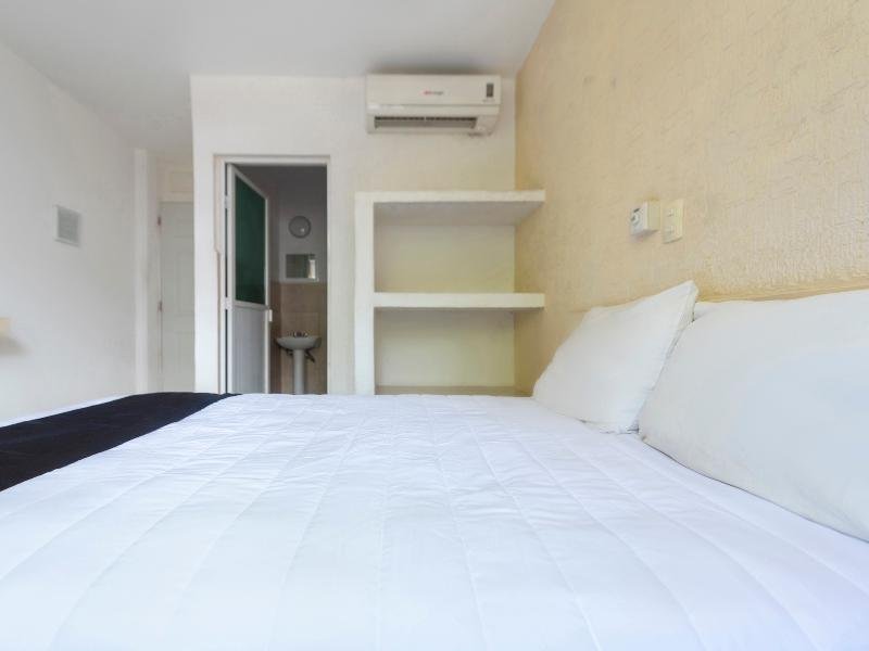 Фото Capital O Hotel El Mejicano