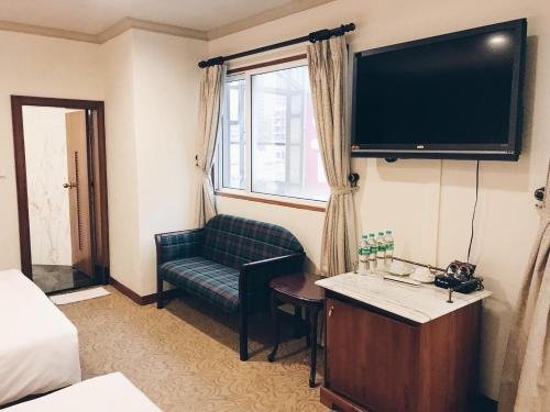 Фото Puyisy Business Hotel