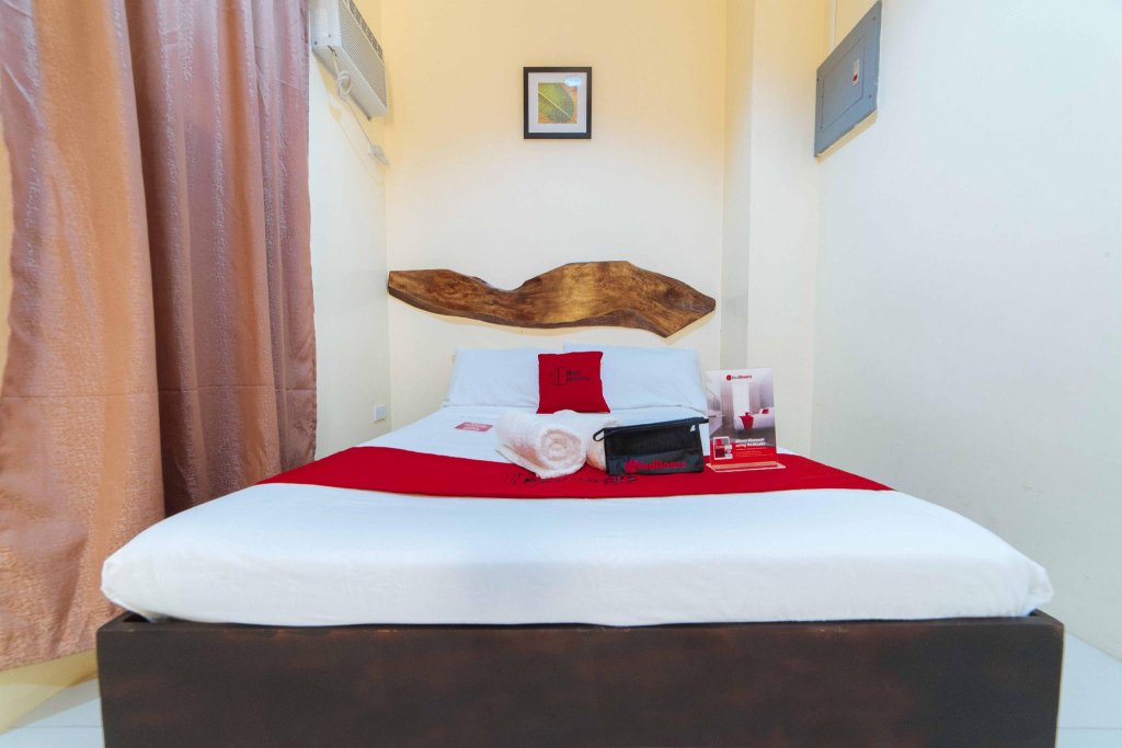 Фото RedDoorz near New Government Center