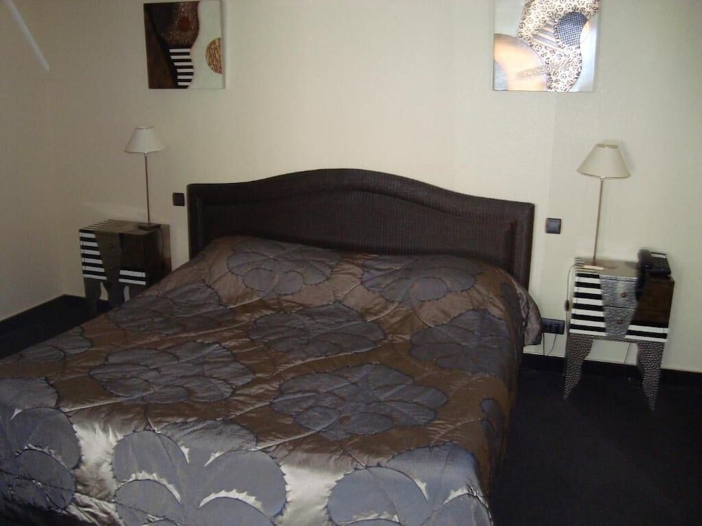 Фото Logis Hôtel de la Croix d'Or