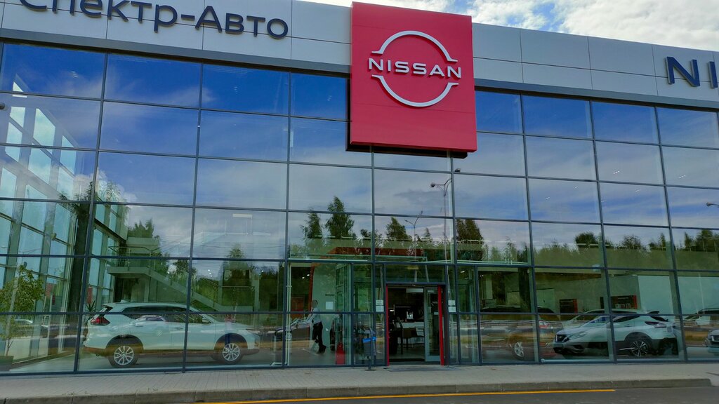 Табличка официального дилера Nissan