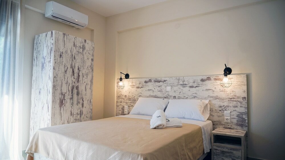 Фото Sinodinos Deluxe Apartments