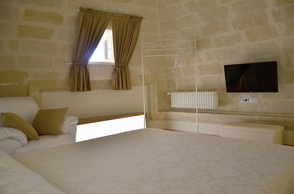 Фото Antica Dimora Storica la finestra sul Campanile