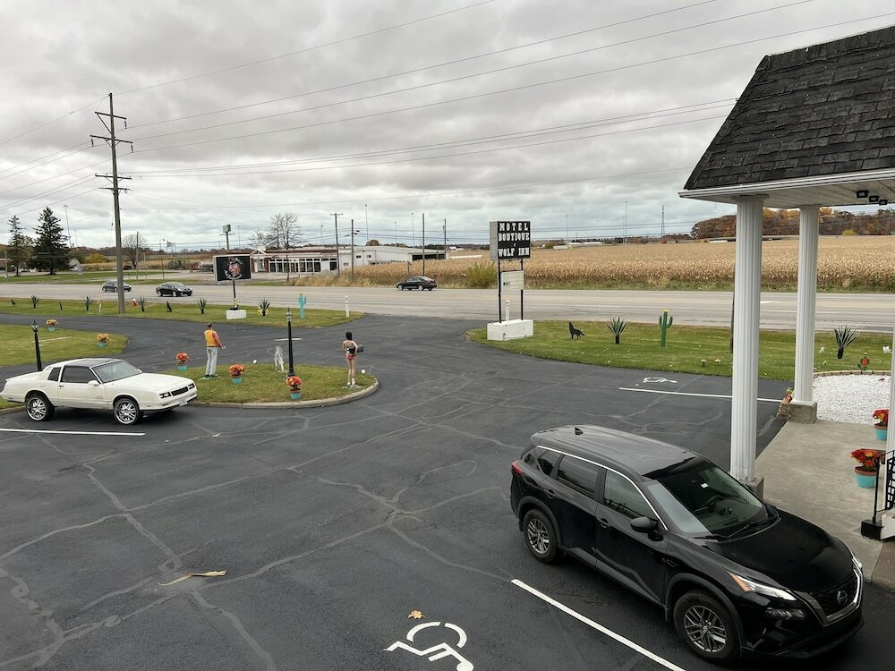 Фото Motel Boutique by Wolf Inn