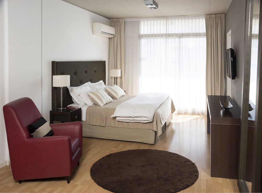 Фото Urbanica The Suites Hotel