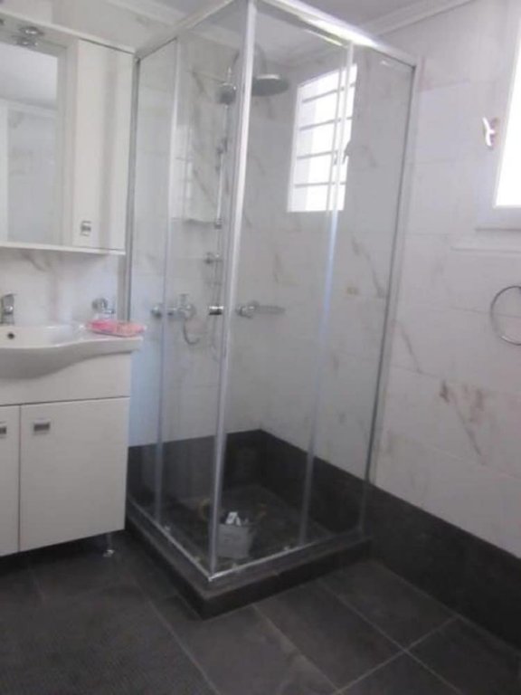 Фото Marion-Athenian Style Apartment