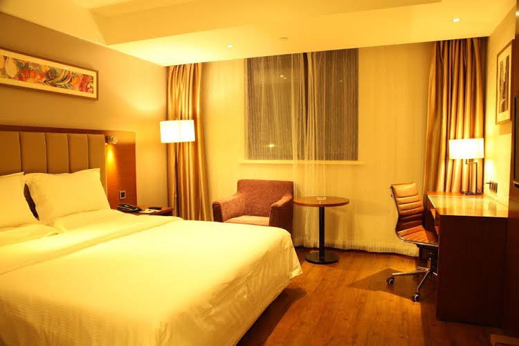Фото GreenTree Inn ShangHai ZhouPu Town XiuPu Road Business Hotel