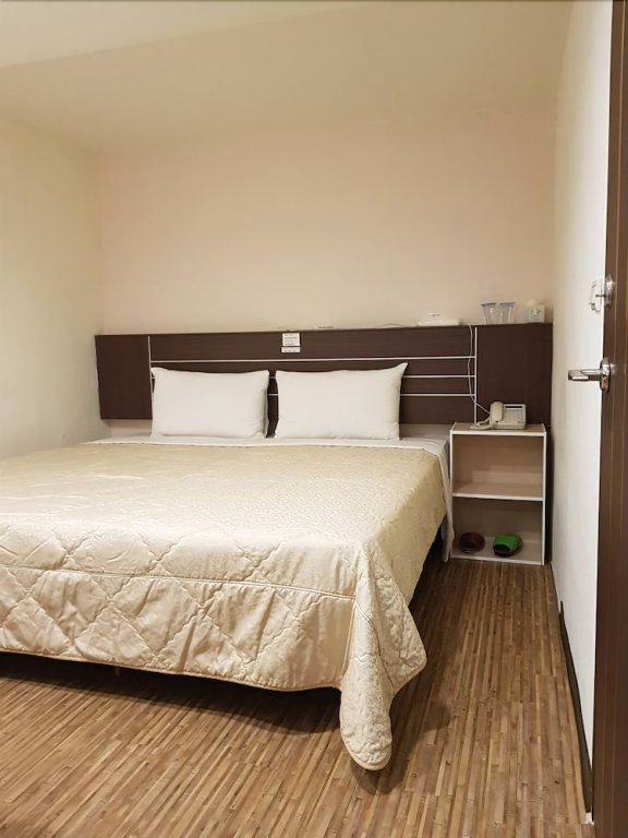 Фото Jhong-Sing Hotel